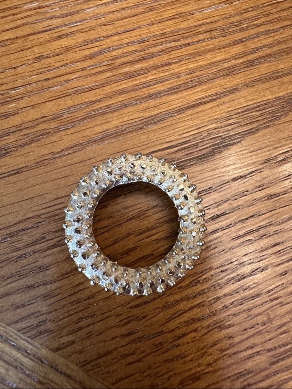 Gold Textured Circular Brooch - Sparkling Gold Accent